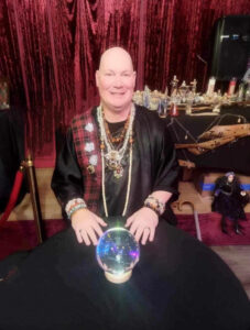 Photo of Brian with a crystal ball