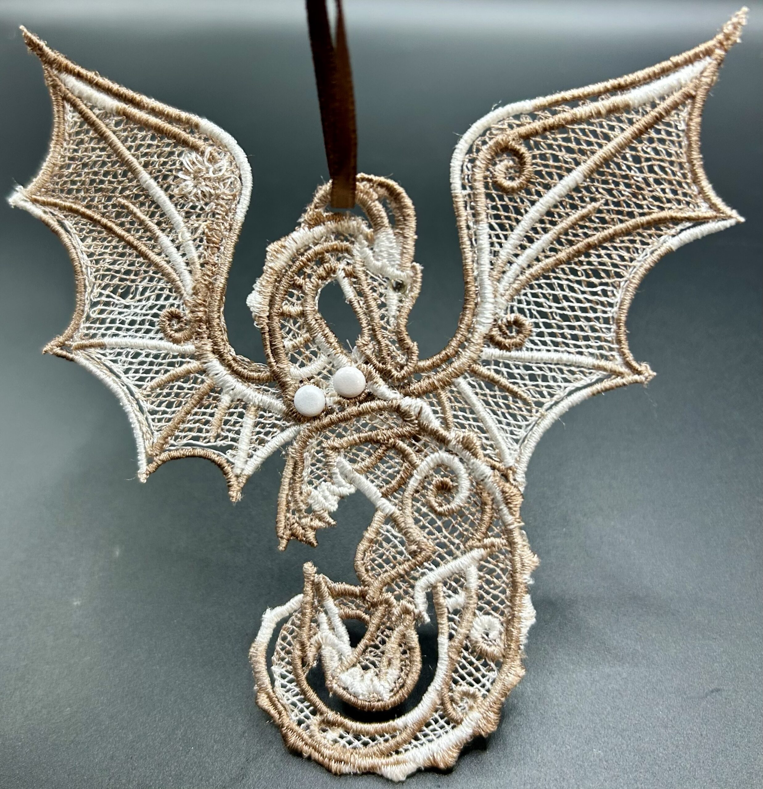 Brown And White Dragon Hanger